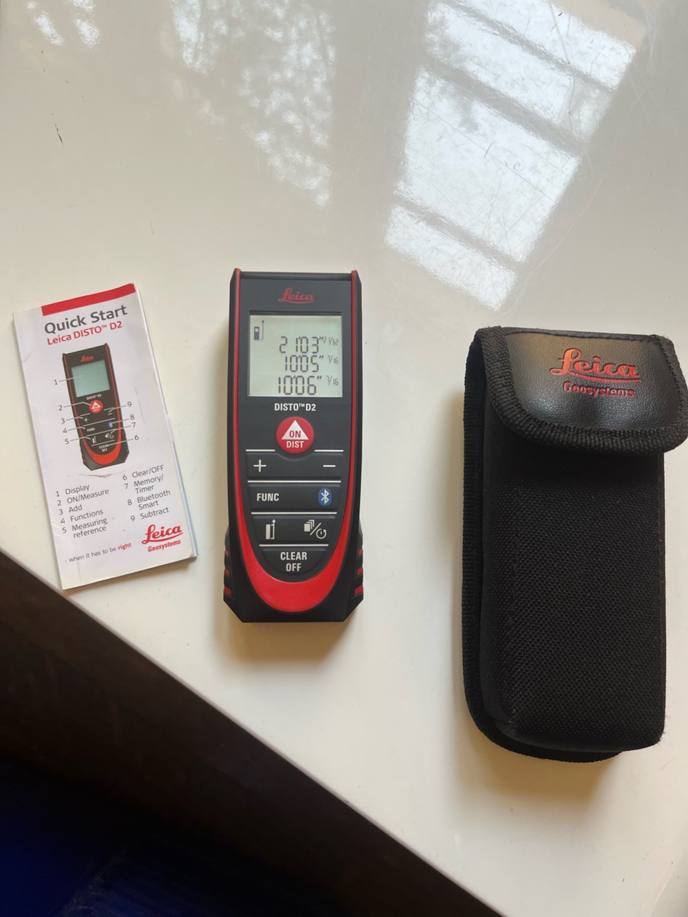 Leica handheld laser distance meter never used.